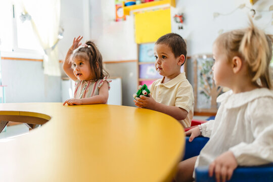 Children learning and participating in active classroom