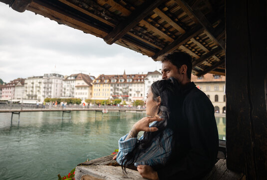 Romantic couple enjoying the scenic city view in Lucerne
