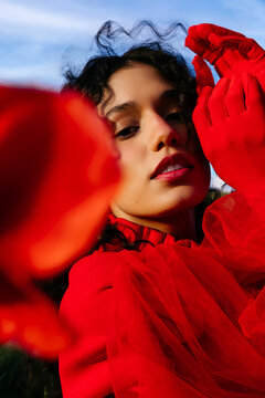 Woman wit red gloves outdoors