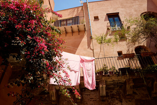 Clothes Hang on a Line in a Courtyard