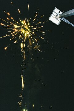 Single Firework Exploding in Night Sky During Lunar New Year