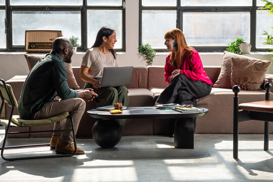 Business Colleagues Having a Casual Meeting and Brainstorming 