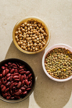 Three bowls with legumes