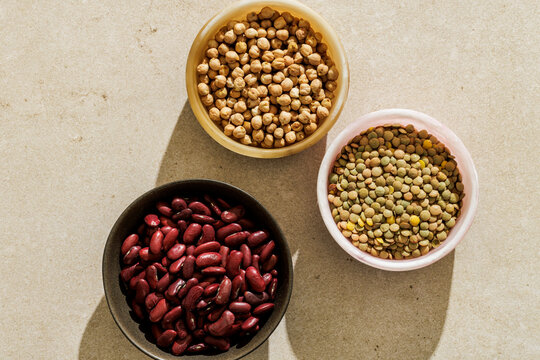 Three bowls with legumes