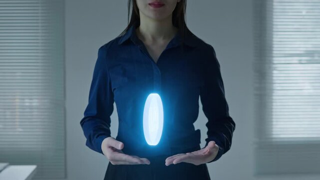 Business woman presenting an AI interface above her hands, representing human interaction with artificial intelligence, automation, digital transformation and future technology