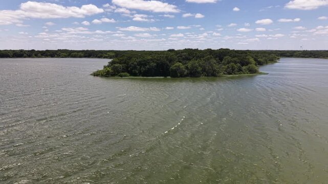 Summer Day Over Quiet Reservoir Bordering Native Forest