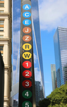 code names with letters and numbers for the subways of nyew york and the skyscrapers in the background ideal as travel and transportation photos