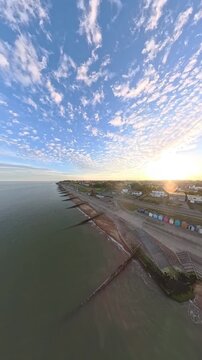 9:16 Vertical 4K Drone Aerial: Old Felixstowe Seafront and Shingle Beach at Sunset