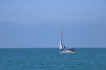 Fototapeta premium Sailing boat on the sea in the summer, closeup of photo