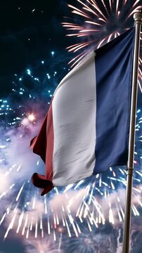France flag waving with fireworks exploding in the background, vertical video celebrating national pride, victory, festive events and patriotic spirit