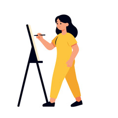 Fototapeta premium Young woman in yellow jumpsuit painting on canvas with brush on easel stand in art class