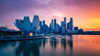 Singapore Skyline and view of skyscrapers on Marina Bay at sunset. © nuttawutnuy