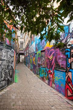 Ghent, Belgium &ndash; September 23, 2024 &ndash; Colorful Graffiti Lane Werregaren Street Ghent Belgium. Colorful Werregaren street with it&rsquo;s graffiti filled walkway in Ghent, Belgium.
