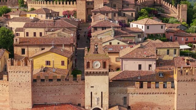 Gradara Castle Aerial Drone Reveal Shot Marche Italy 70mm Telephoto Cinematic Footage Walled Medieval Village Sunset Golden Hour Adriatic Sea View Historic Fortress. Borghi pi&ugrave; belli d&rsquo;Italia