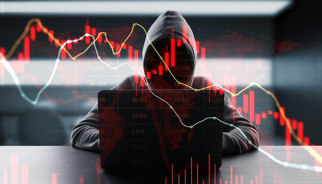 Anonymous hooded figure with laptop behind falling financial charts and glowing lines on dark background depicting risk and cyber threat concept.