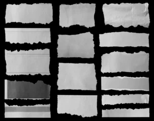 Torn papers on black © Stillfx