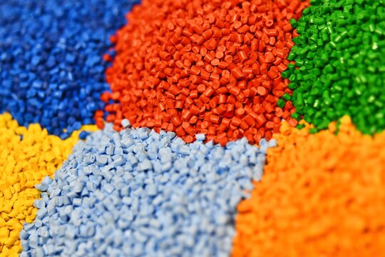 Colourful plastic polymer granules