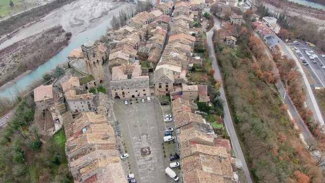 Aerial view of the historic center of Ainsa, a beautiful medieval village in the Pyrenees of Huesca, Aragon, featuring its castle and main square