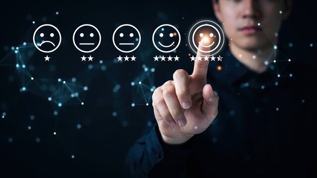 Business person giving a positive rating with digital glowing feedback face icons