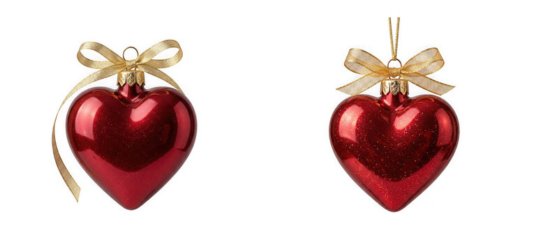 Two red heartshaped christmas ornaments with gold ribbons isolated on transparent background
