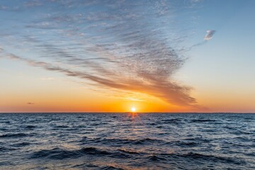 sunset over the sea © JStinnett