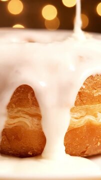 Macro Shot Of A Glazed Donut With Sugar Glaze Dripping And Fluffy Dough Texture