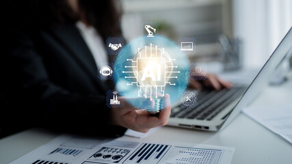Business Person Holding Light Bulb with AI Symbol in Front of Laptop and Charts, Representing Innovations in Artificial Intelligence and Technology Solutions. Glyphic. © InfiniteFlow