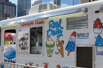Naklejka premium Real Dairy traditional ice cream truck at sporting event celebration at Nathan Phillips Square, Toronto