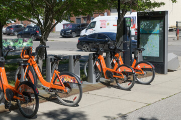 Naklejka premium Bike Share Toronto docking station near Cariboo Av, northern most entry to the West Toronto Rail Path trail