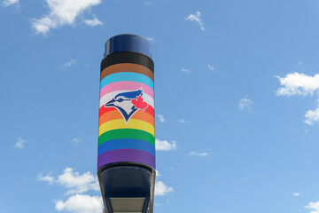 Naklejka premium Toronto Rogers Centre Gardiner LED Pylon (located at Rees St & Bremner Blvd) with advertisement for Pride Month and Toronto Blue Jays