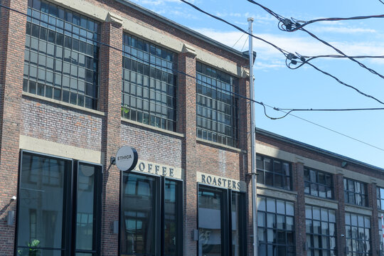 exterior building facade and sign of Ethica Coffee Roasters, a coffee roastery, located at 213 Sterling Rd, Toronto