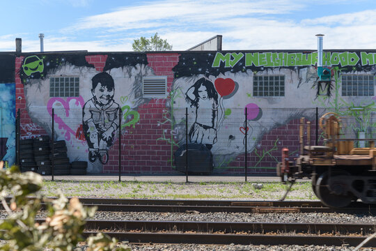 mural near the rear of My Neighbourhood Mechanic located at 4 Cariboo Av - side facing CP's MacTier Subdivision, Toronto