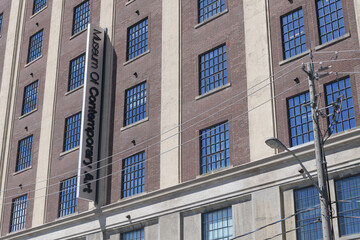 Naklejka premium exterior historic building facade and sign of MOCA (Museum of Contemporary Art), 158 Sterling Rd, Toronto (Tower Automotive Building in the Junction Triangle)