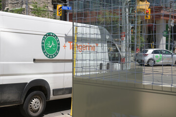 Fototapeta premium Bike Share Toronto service vehicle on Dundas St W near McCaul St