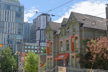 Fototapeta premium historic house and location of Above Ground Art Supplies at 74 McCaul St (looking south to Queen St W), Toronto