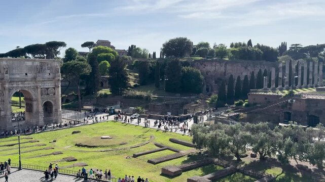 Elevated View of Arch of Constantine in Rome with Tourists