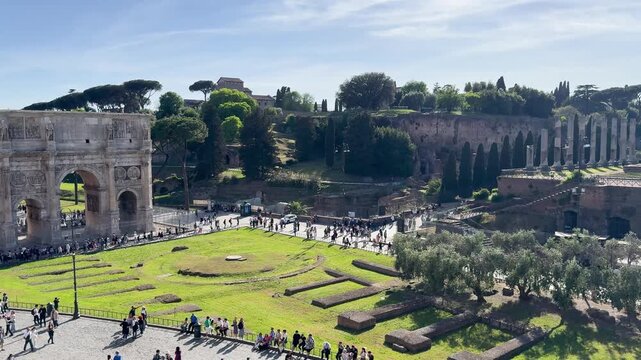 Elevated View of Arch of Constantine in Rome with Tourists