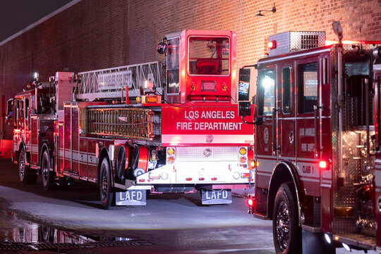 Los Angeles, California, USA - June 18, 2026: Firefighters arrive on scene to secure the fire at the cold storage facilty following another flare up of the solar panels.