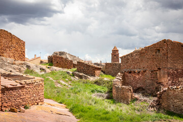 Fototapeta premium ruins of old houses in Rodenas village, province of Teruel, Aragon, comarca of Sierra de Albarracin, Spain