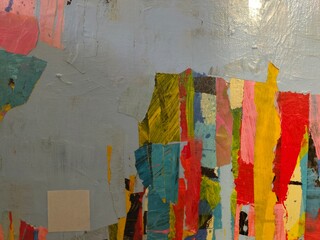 Fototapeta premium Abstract collage with colorful vertical washi tape strips against grey painted canvas