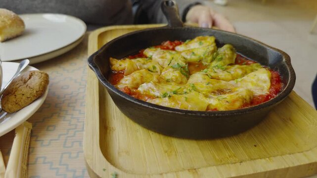 Cabbage Rolls Baked With Minced Meat In Tomato Sauce In Cast Iron Skillet. Delicious Dinner Dish