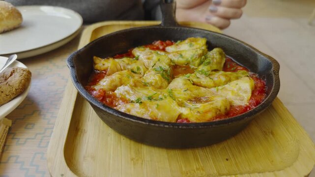 Stuffed Cabbage Rolls Baked In Tomato Sauce. Hot Cabbage Leaves Filled With Minced Meat In Cast Iron Pan 