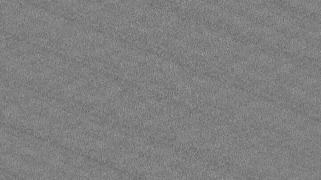 Realistic, subtle gray film grain texture. Seamless loop for adding a cinematic, vintage, or analog look to footage. Use with overlay or soft light blend modes for authentic effect