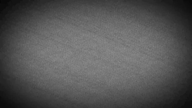 Realistic, subtle gray film grain texture. Seamless loop for adding a cinematic, vintage, or analog look to footage. Use with overlay or soft light blend modes for authentic effect