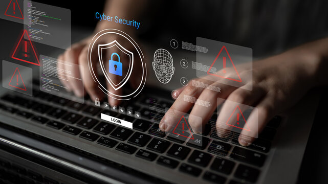 A user types on a laptop keyboard, surrounded by graphics symbolizing cyber security. The image highlights essential elements of digital protection and data safety in the technology realm. Ledger