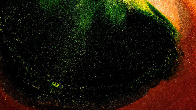 Exploring the spread of alcohol inks in vibrant colors through macro lens
