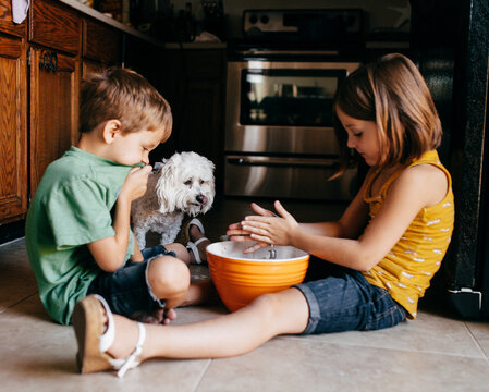 Kids cooking on kitchen floor