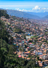 Fototapeta premium View of Cusco, Peru, on the slopes of Andes mountains, taken from Sacsayhuaman ruins.