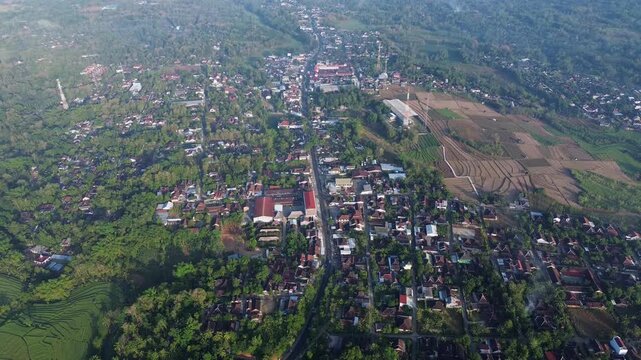 Aerial Drone View of Small Town and Rural Agricultural Landscape in Indonesia