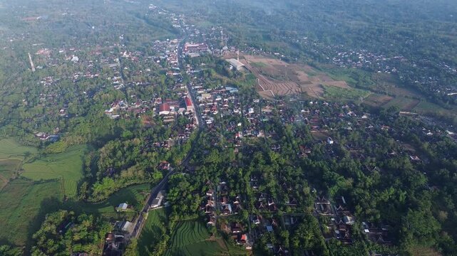 Aerial Drone View of Small Town and Rural Agricultural Landscape in Indonesia